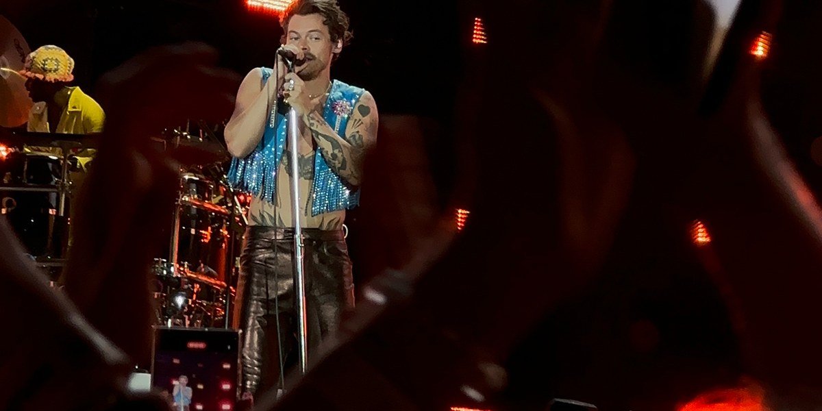 Harry Styles singing on stage during his Love On Tour concert in Barcelona