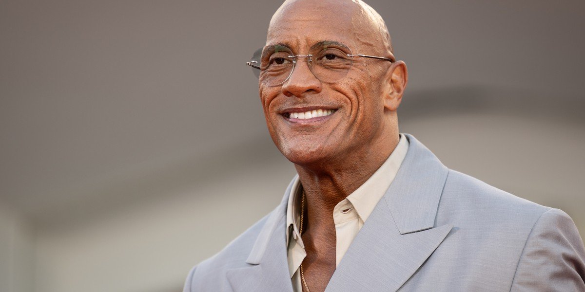 Dwayne Johnson smiling at the 2025 Venice Film Festival